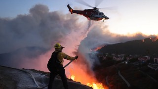 LA Wildfires Day 2: Images of Turmoil, Teamwork and Devastation Across the City | Photos